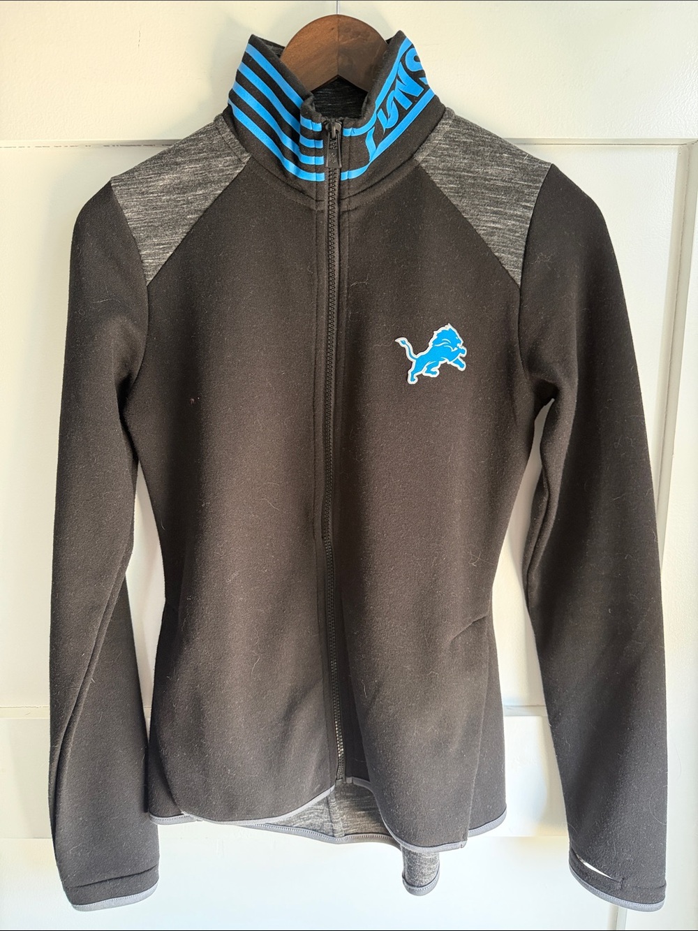 Detroit Lions NFL Black Full Zip Jacket with Blue Logo and Gray Accents
